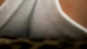 Нежно мастурбирует пальчиком клитор