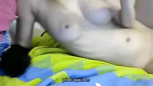 Сисястая в маске Horny-Rabbit мастурбирует письку